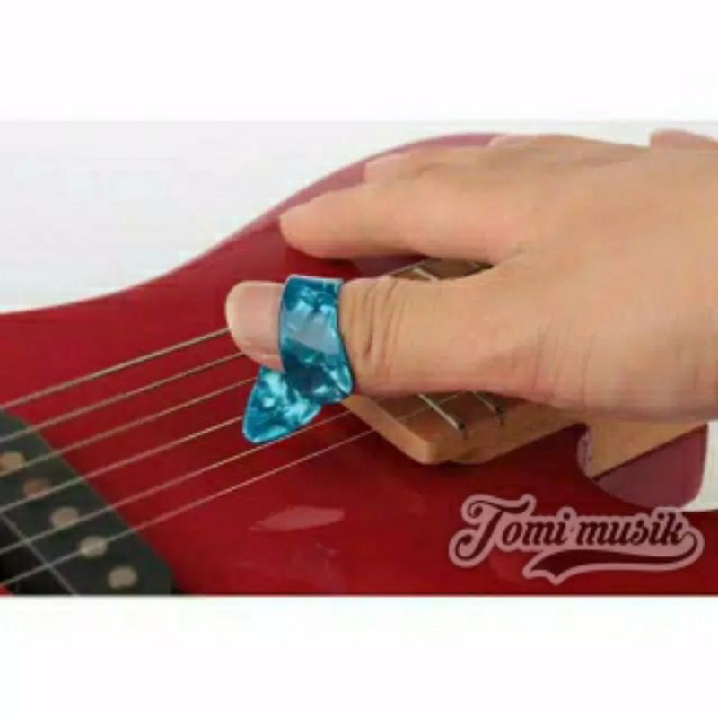 Pick gitar jempol
