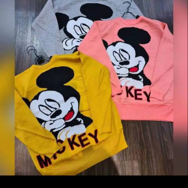 

Sweater Guc*ci micky import, ada tag dan label