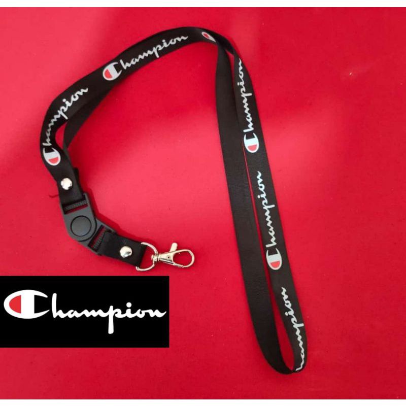 

GANTUNGAN KUNCI CHAMPION LANYARD BRAND DISTRO NAME TAG ID CARD GANTUNGAN LEHER PODS
