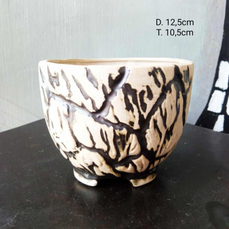 pot relief batu mangkok