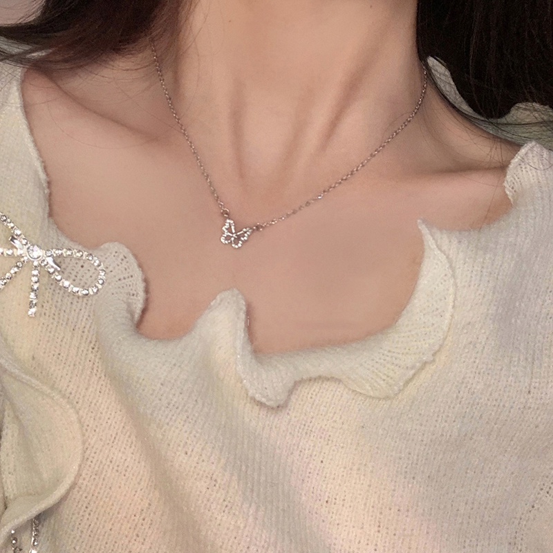 Kalung Choker Rantai Desain Kupu-Kupu Hollow Aksen Kristal Gaya Korea Untuk Wanita