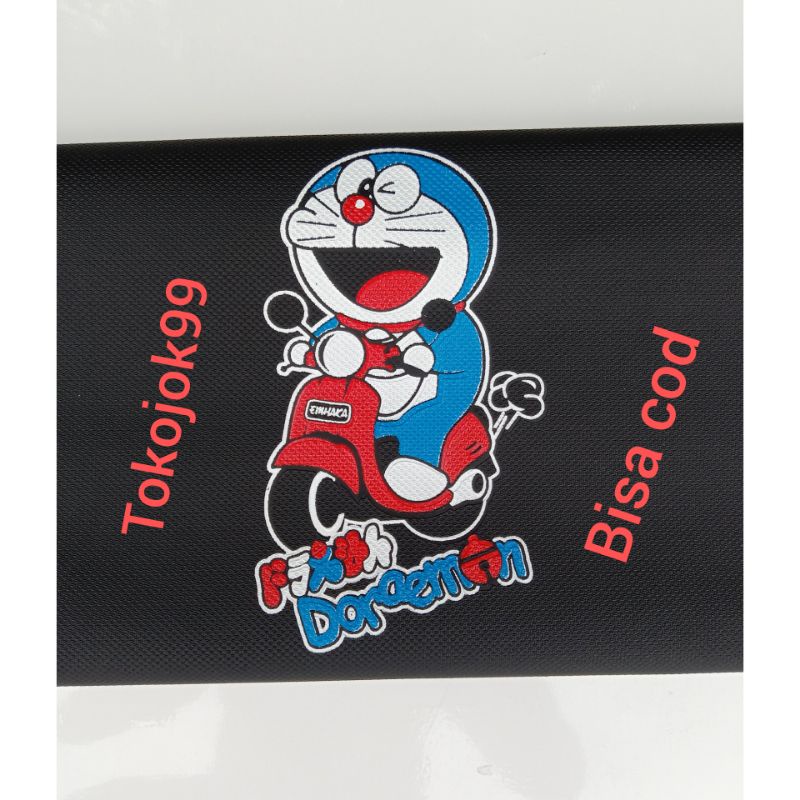 cover kulit jok motor spon logo doraemon kecil