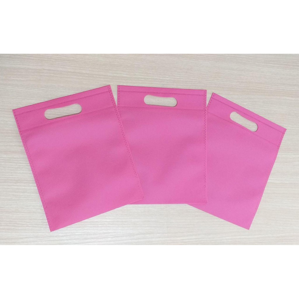 

GOODIE BAG OVAL MURAH (Per Kodi) / SPUNBOND / Tas Belanja MURAH / 20x25 (Warna Pink)
