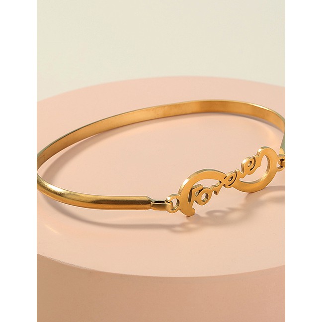LRC Gelang Tangan Fashion Golden Color Stainless Steel Letter Alloy Hollow Bracelet P12362