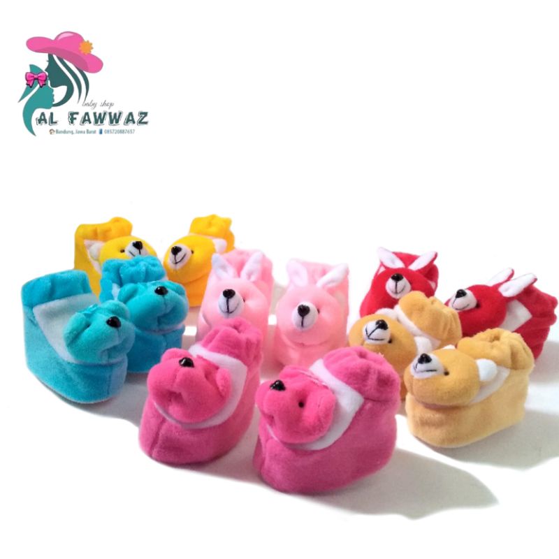 Sepatu bayi bulu boneka