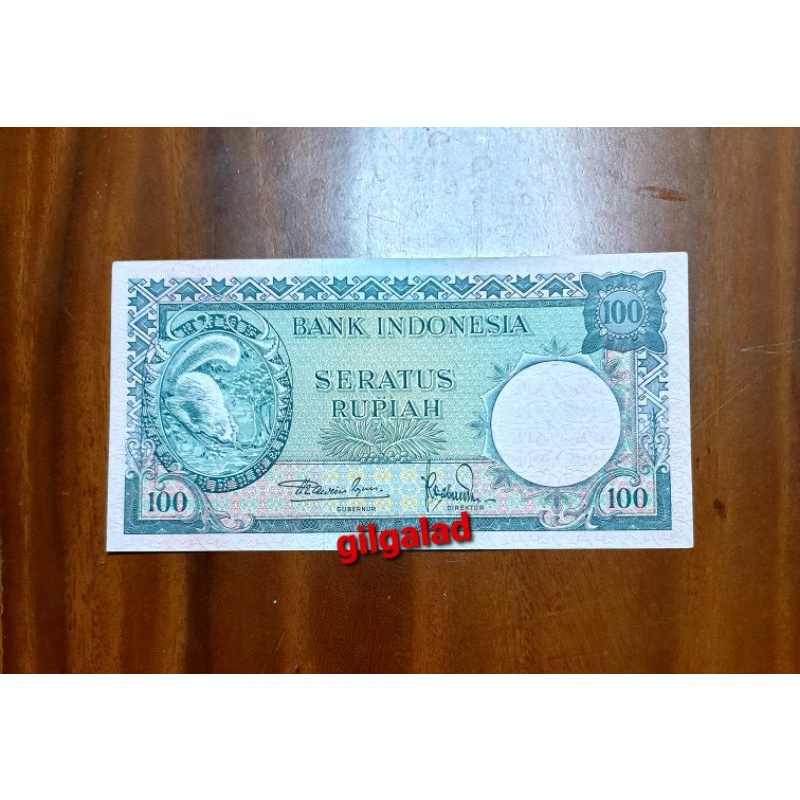 UANG KUNO 100 RUPIAH TUPAI 1957 AU