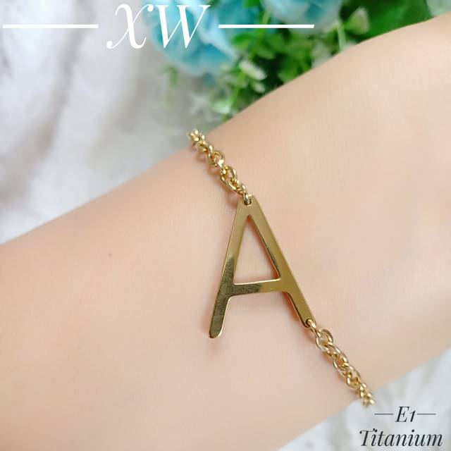 Gelang Inisial titanium gold