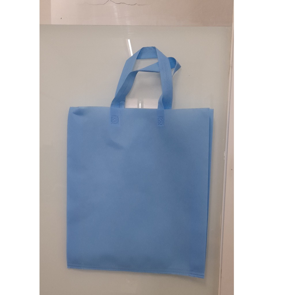 

(Lusin) Tas Press Spunbound Tali Goodie Bag Tas Belanja Warna Baby Blue 38 cm x 45 cm