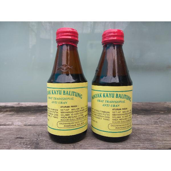 ORIGINAL Minyak Kayu Balitung KALIMANTAN Minyak Penyubur Rambut Membuat Ranbut Tampak Hitam KUALITAS