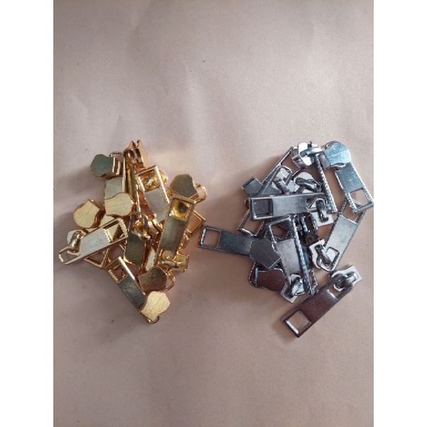 KEPALA RESLETING UNTUK GIGI BESI/KEPALA ZIPPER REL BESI @12 PCS