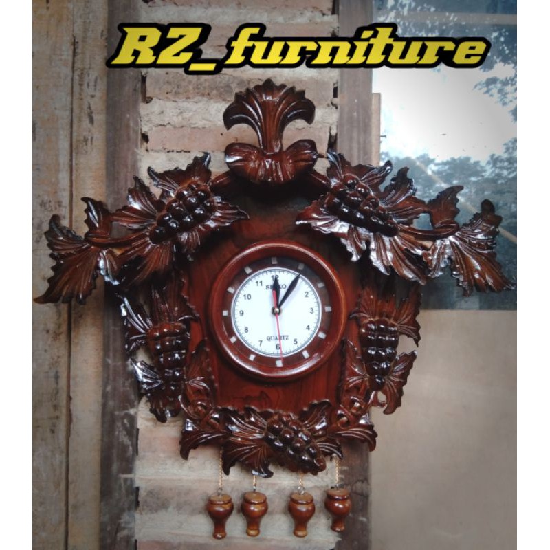 Jam dinding bunga khas jepara