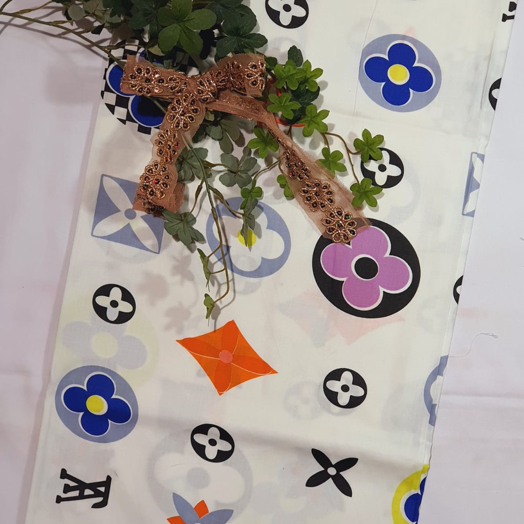 Kain Perca Motif LV Latar Putih