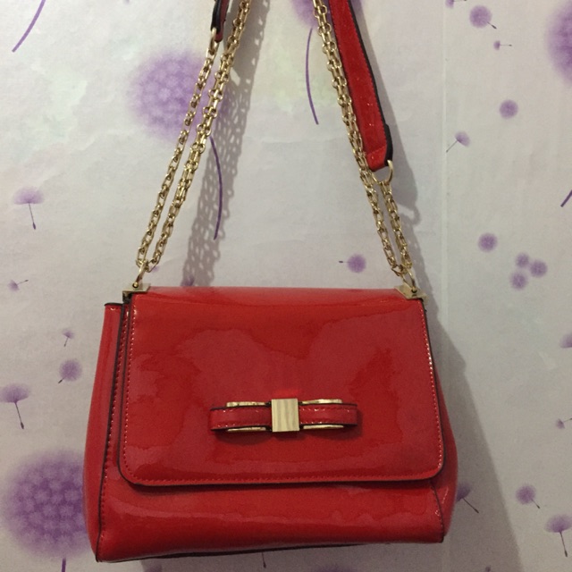 Tas glossy