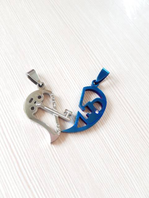 Liontincouple/ liontinkalungtitanium cp9