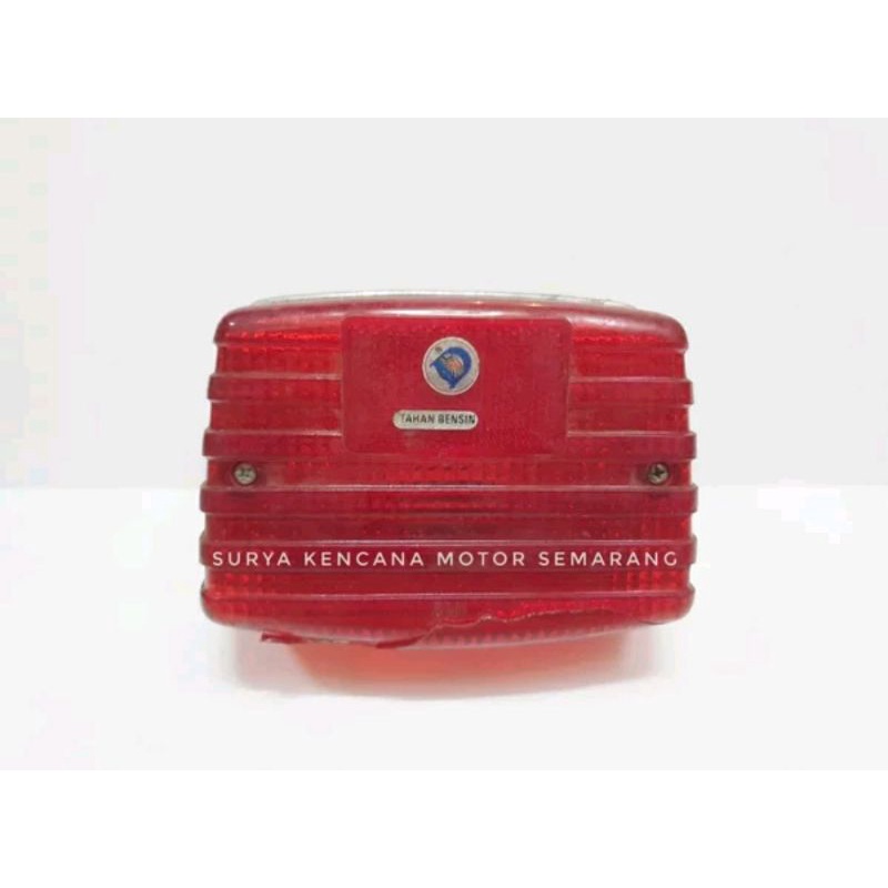 Lampu belakang stoplamp stop Suzuki TRS merk DMI cacat