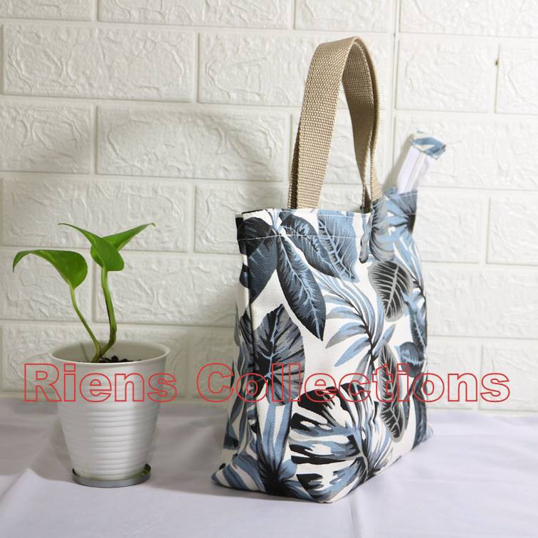 RIENS COLLECTIONS. HANDBAG BESAR BAHAN KANVAS MOTIF ADENIA ABU. TAS KANVAS. TAS WANITA KANVAS. TAS SOUVENIR JOGJA