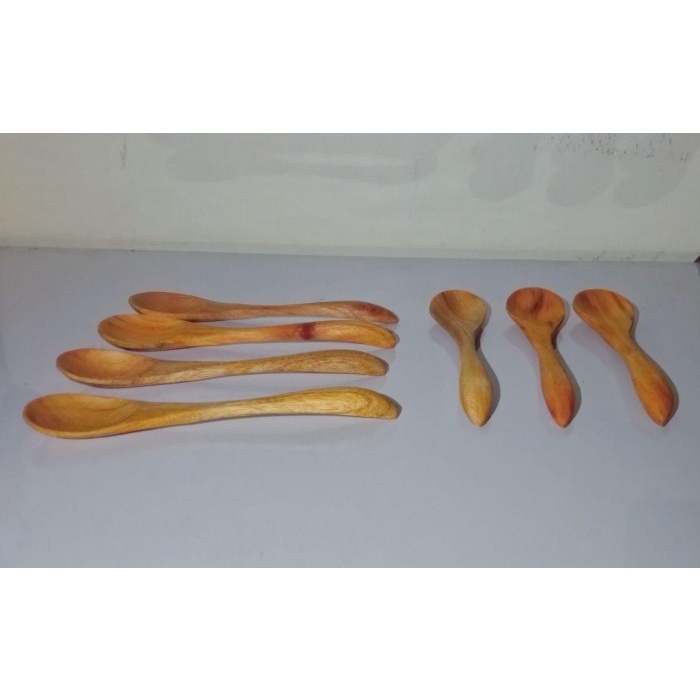 

madu- sendok kayu untuk minum madu -madu.