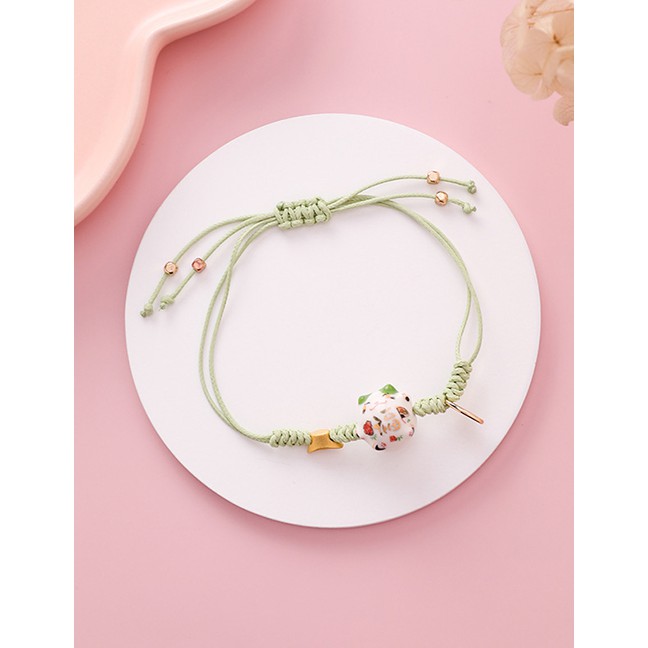 LRC Gelangh Fashion Woven Ingot Ceramic Cat Elastic Bracelet F89357