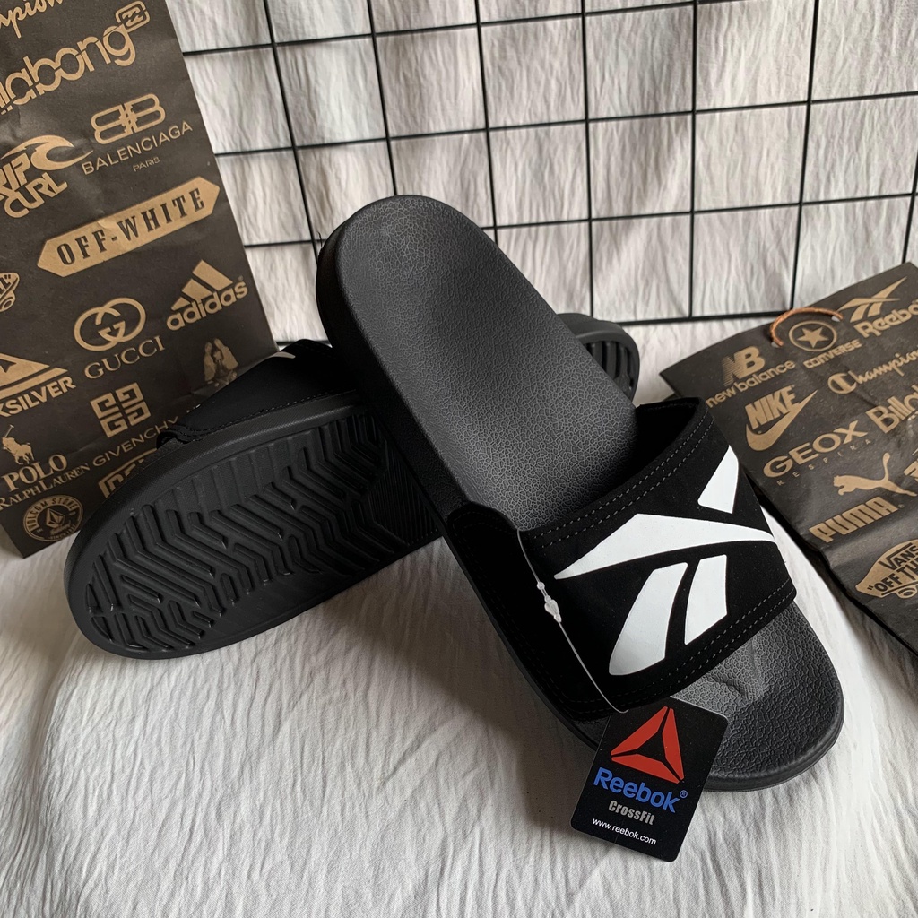 Sandal Cowok Slipon Simple Keren SANDAL KEKINIAN SLIP ON DISTRO PREMIUM SLOP PILON IMPORT SANGAT RINGAN DIPAKAI DAN ANTI AIR FREE PAPERBAG Sandal Slop Polos Slide Pria Import Sandal Cowok Slipon Simple Keren  FLIPFLOP PRIA WANITA REBOKCROSSFIT BLACK