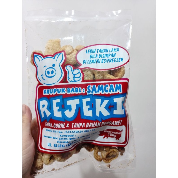 

KERUPUK BABI SAMCAN (REJEKI) Uk. 70 Gr OLEH OLEH KHAS BALI