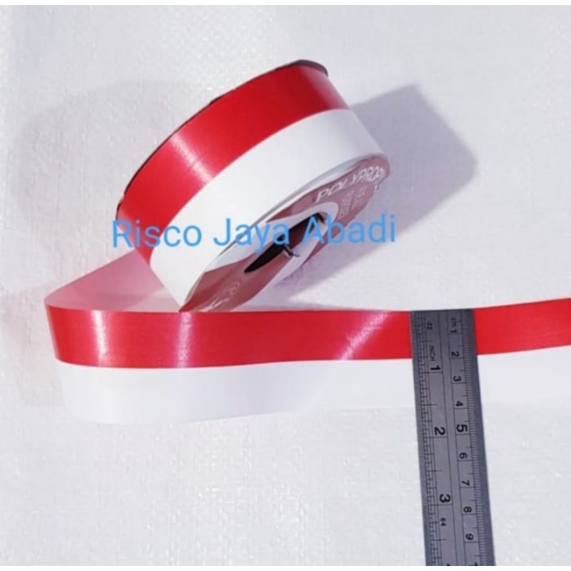 PITA MERAH PUTIH LEBAR 4CM BAHAN PLASTIK ISI 15 YARD