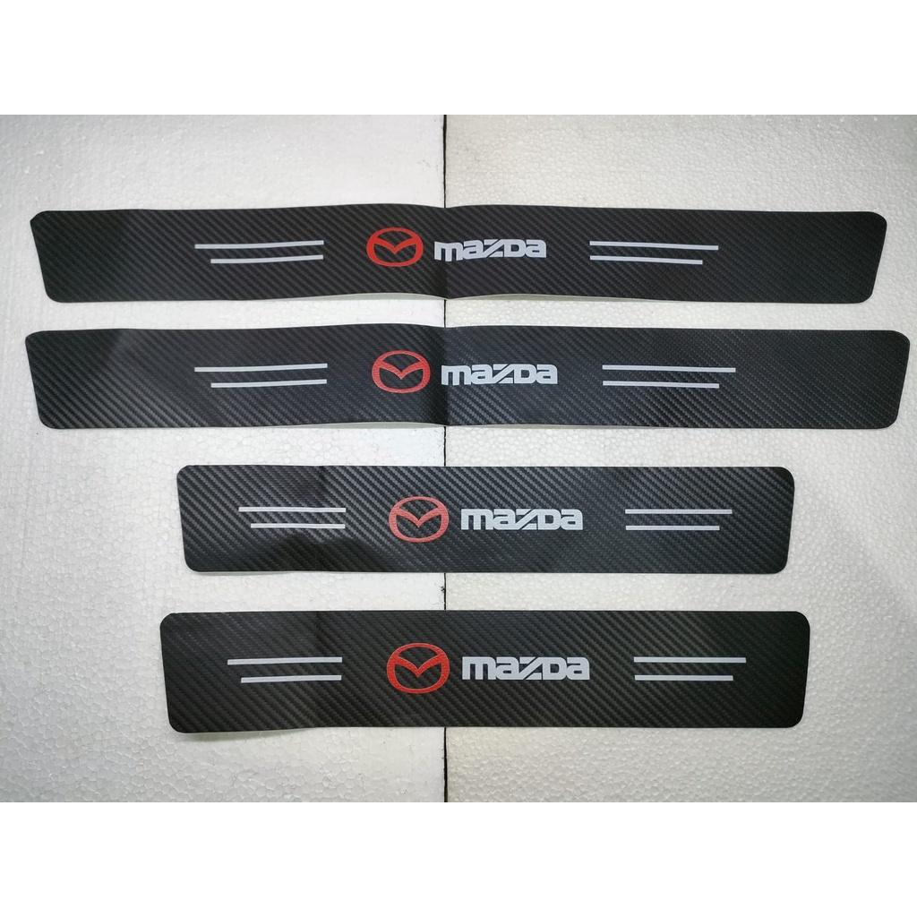 Stiker strip Mazda motif  karbon carbon pelindung pijakan kaki pintu masuk mobil anti gores lecet sticker aksesoris variasi logo merk bisa untuk semua type Mazda 2 3 6 8, Biante, CX-3, CX-5, CX-8, CX-9, CX-30, BT-50 PRO single double kabin hatchback sedan