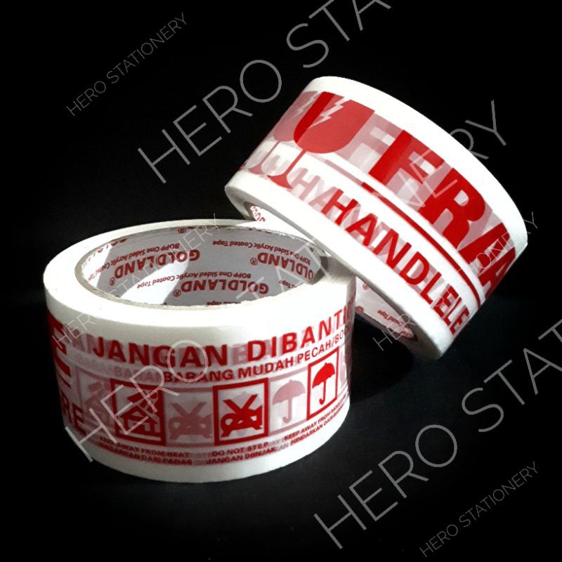 

Lakban selotip tape motif logo fragile handle with care jangan dibanting 2 inch putih . 1 roll