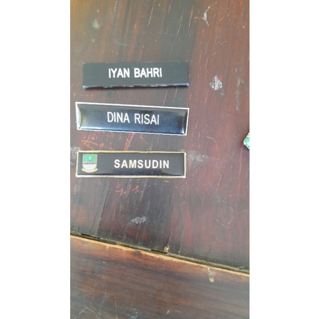 

papan nama dada dof