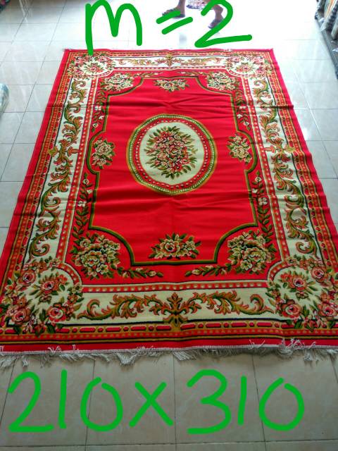 Karpet permadani motif kembang merah