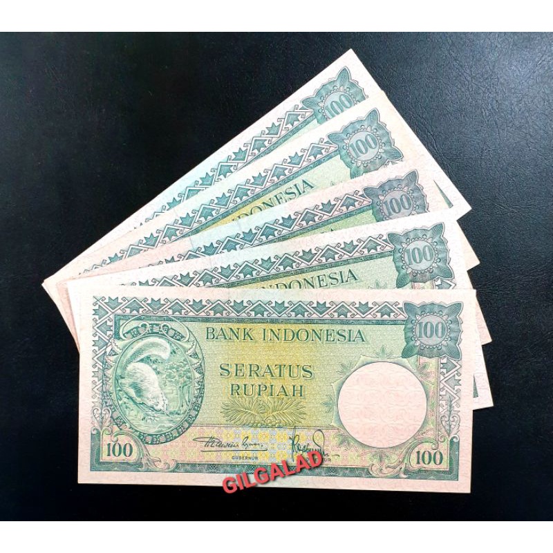 UANG KUNO 100 RUPIAH TUPAI 1957 BAGUS KONDISI AU