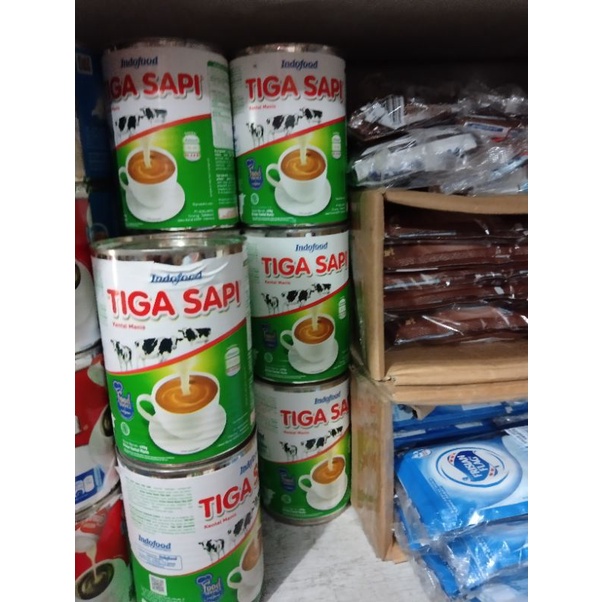 

tiga sapi kaleng