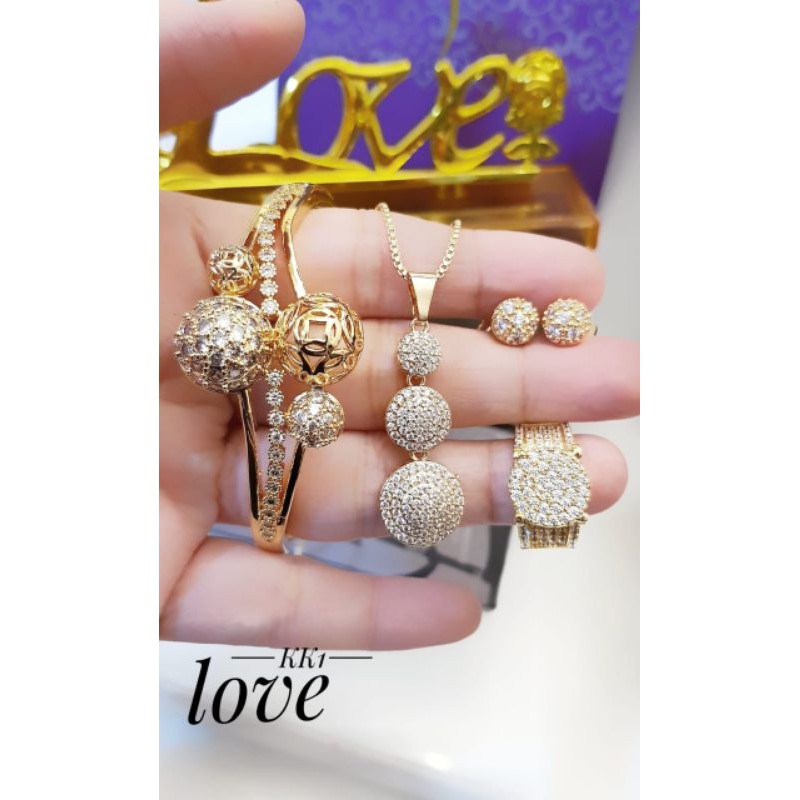 new set dewasa.perhiasan  xuping & titanium murah surabaya.grosir lebih murah