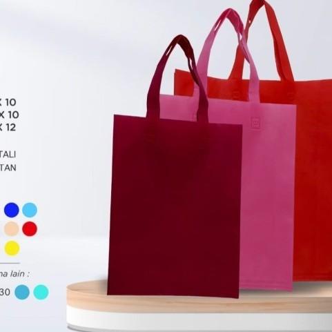 

♖ Tas Kain SPUNBOND Tali Goodie Bag Uk 30 x 40 Perlusin - Merah ➦