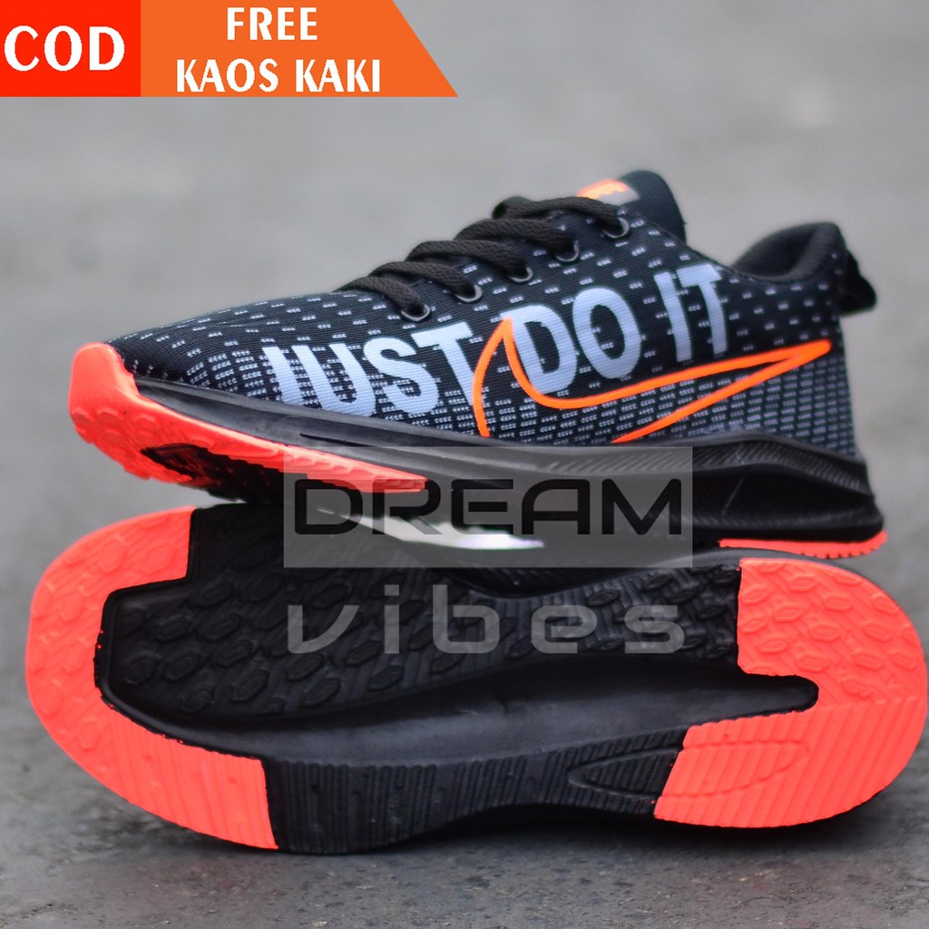 orange nike just do it shoes