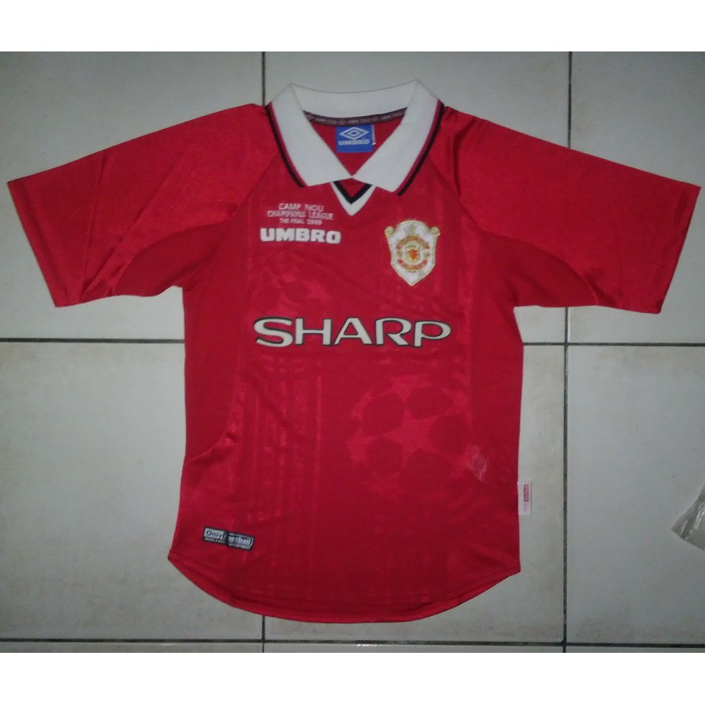 JERSEY MANCHESTER UNITED UCL RETRO 1999 Termurah