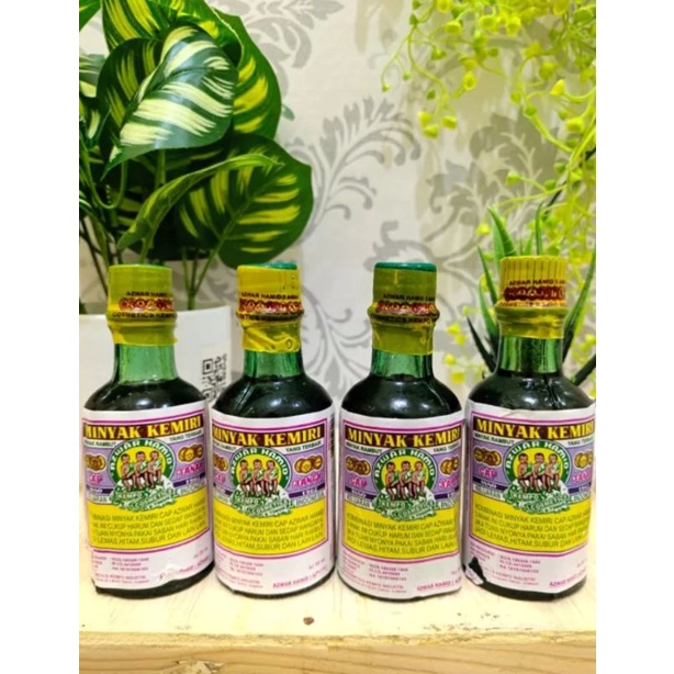 MINYAK KEMIRI CAP 3 ANAK/Minyak Rambut kemiri @ 60 ml