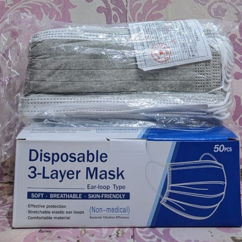 Masker ducbil putih hitam 3 layer isi 50