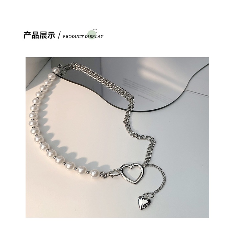 Baja Titanium Mutiara jahitan rantai hollow jantung liontin kalung wanita angin dingin niche desain