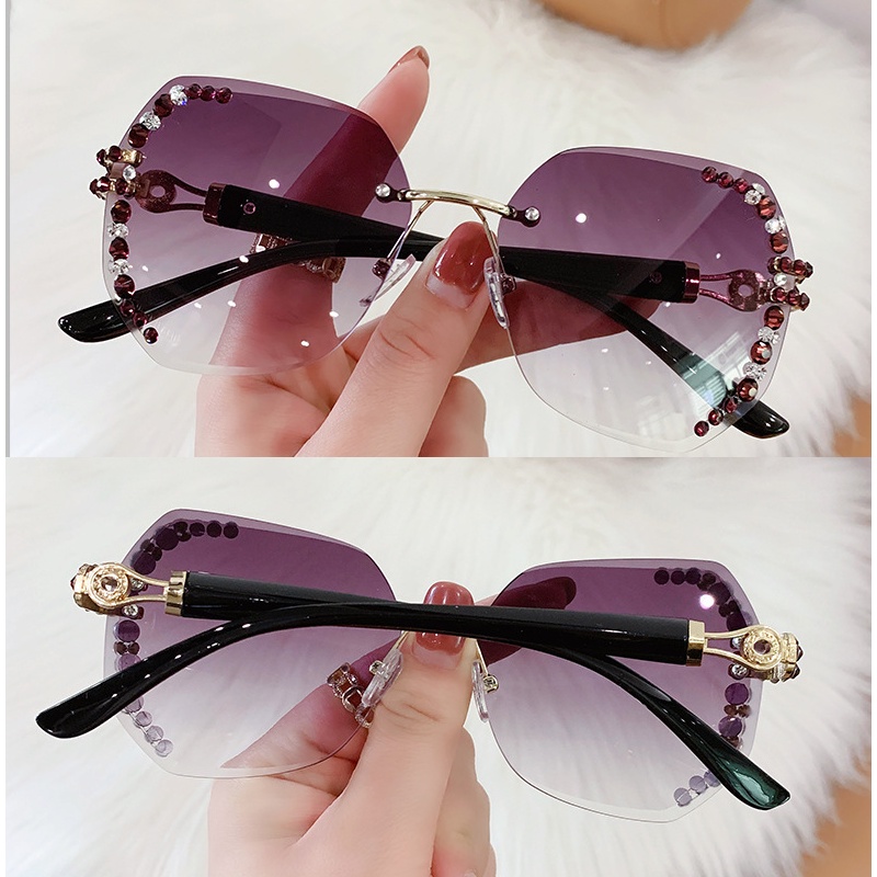 Kacamata Hitam Tanpa Bingkai Pelindung UV Gaya Vintage Untuk Wanita