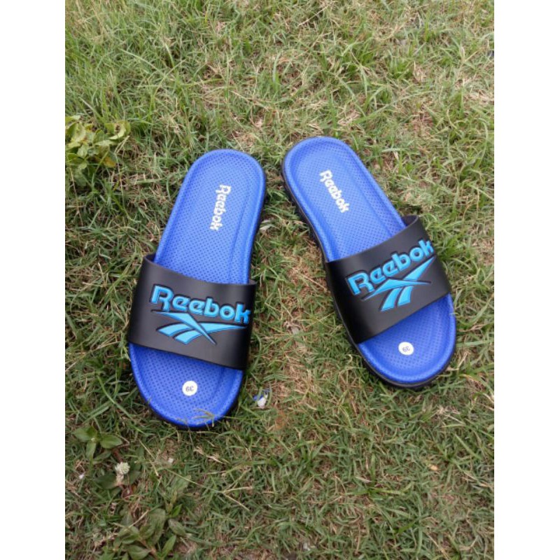 Sandal selop kickers silang garis garis biru