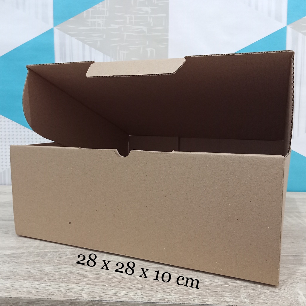 

Kardus 28 x 28 x 10 cm....Die Cut kotak aksesoris dll