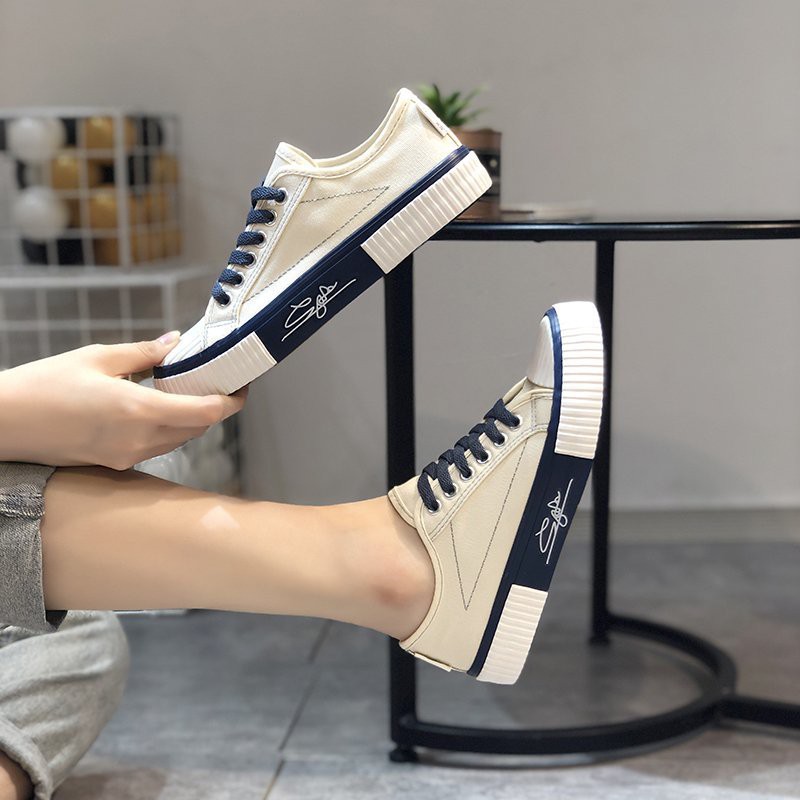 Sepatu kanvas renda gaya Korea wanita gaya baru mahasiswa fashion sepatu datar kasual tren