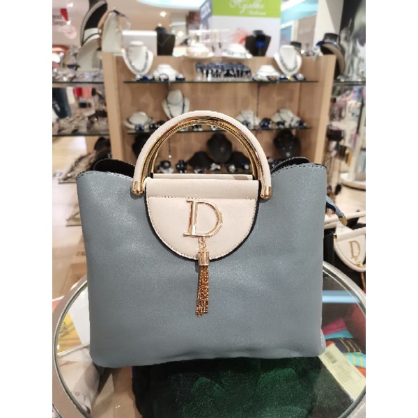 Tas jinjing wanita merk Scada