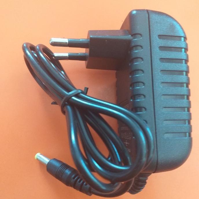 adaptor AC to DC 12v 1A soket kecil .