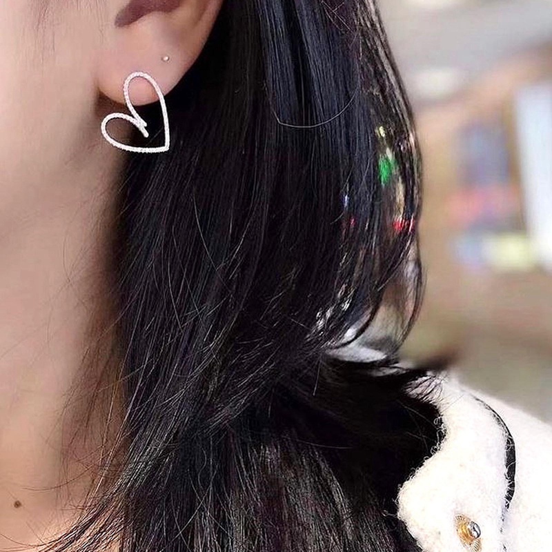 Fancyqube Anting Stud Bentuk Hati Model Hollow Out Bahan Cubic Zirconia Warna Silver Untuk Wanita