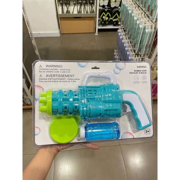 BUBBLE GUN WITH SIX HOLES PISTOL AIR MINISO