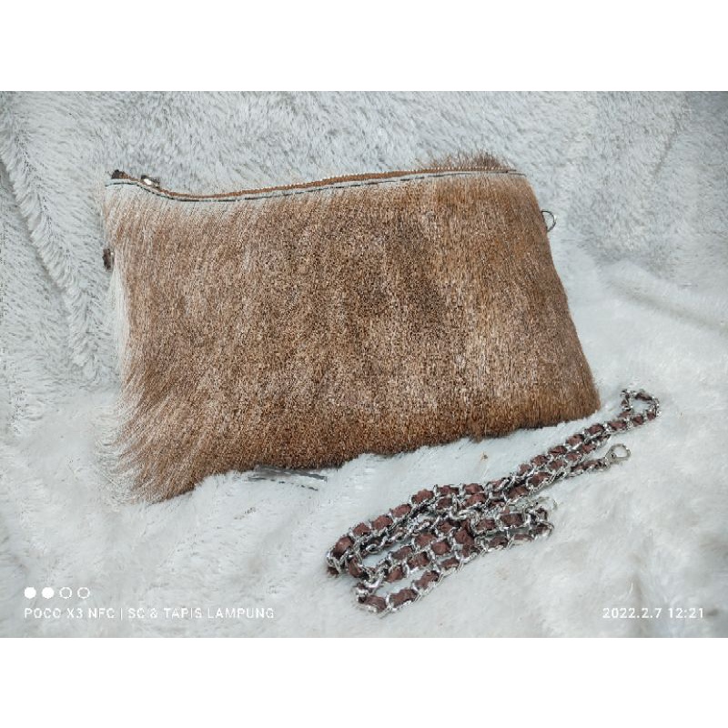 Tas selempang kulit ular dan bulu kambing