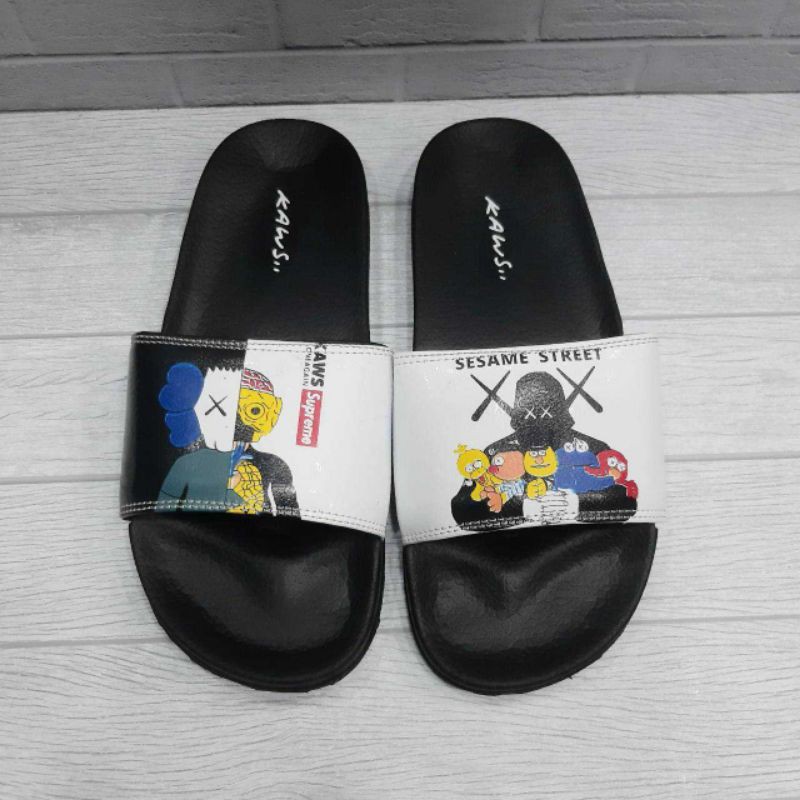 Restock sendal kaws x supreme putih