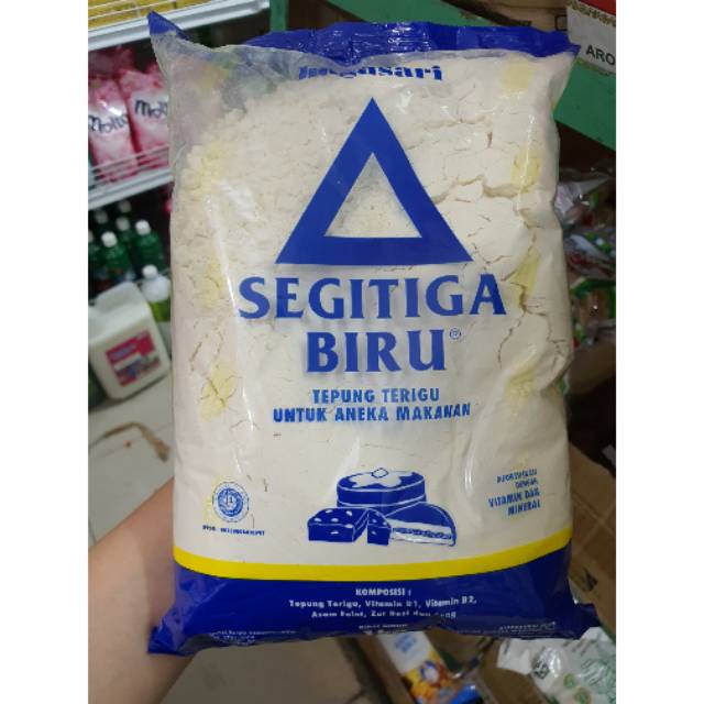 

TEPUNG BOGASARI segitiga biru / cakra kembar / kunci biru