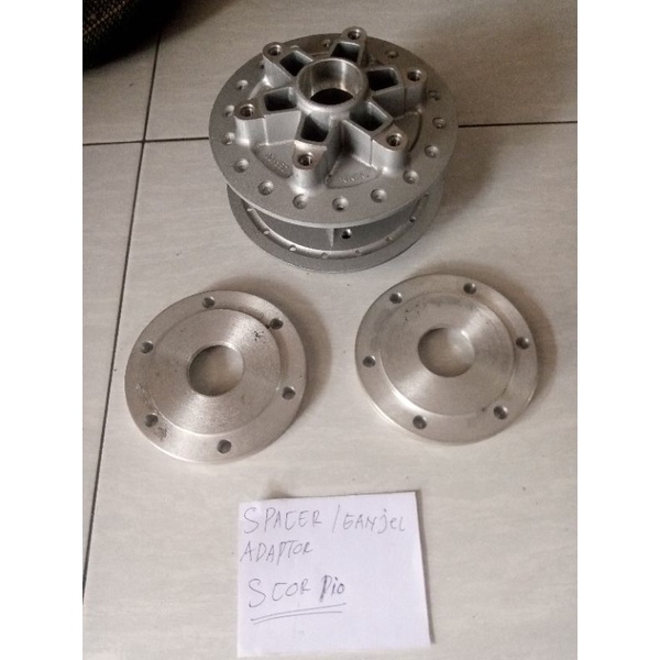 spacer tromol depan Scorpio adaptor cakram depan Scorpio ganjel cakram depan Scorpio pakai cakram Ju